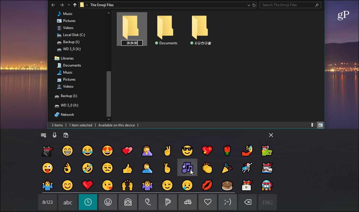 Klepněte na Průzkumník souborů Emoji klávesnice