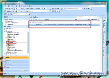 Outbox Outlook afișând e-mail programat 